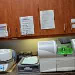 Laboratory counter with dental equipment including centrifuge and processing machines